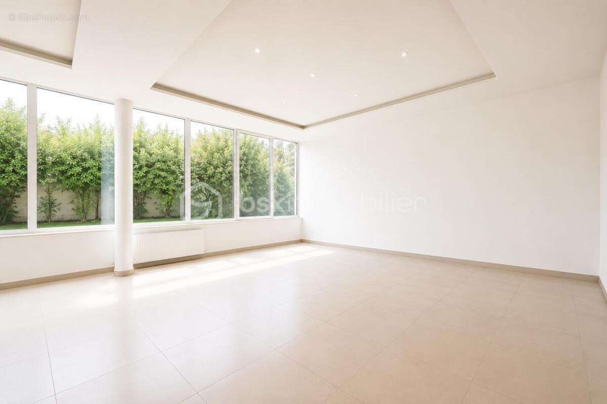 Colombes – maison d’architecte de 193 m² avec dépendance, sous-sol total et jardin paysager – un bien rare aux portes de paris - photo 5