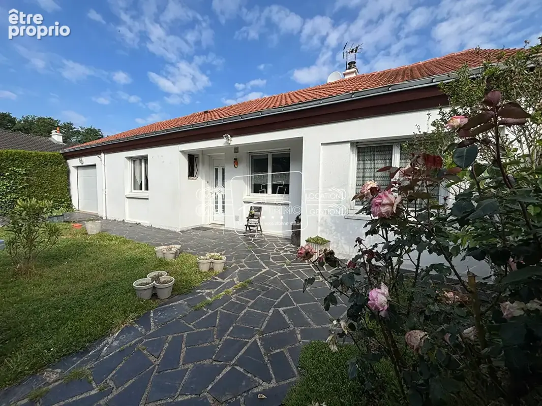 Saint-Sébastien-sur-Loire Maison plain-pied 94 m² Terrain 435 m² - photo 7