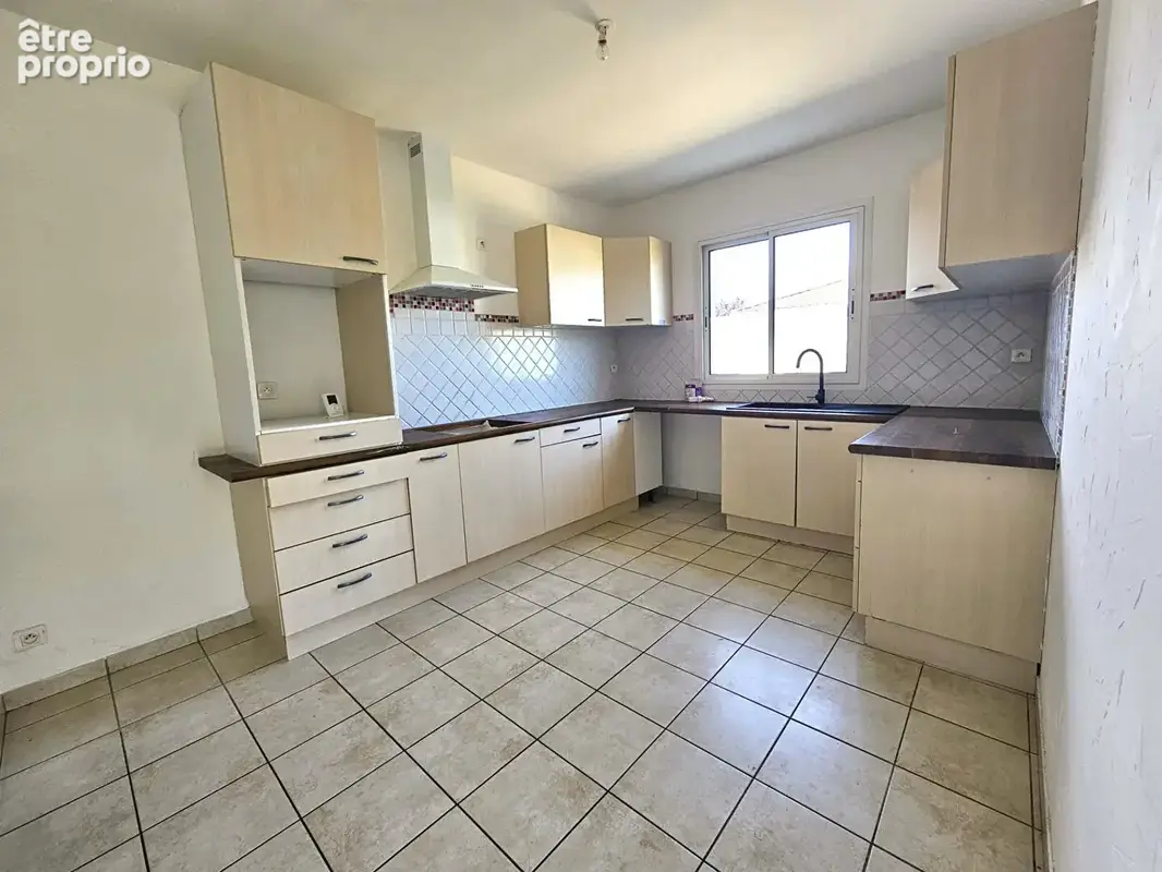 Maison 110 m²  avec 2 chambres, jardin et garage - photo 7