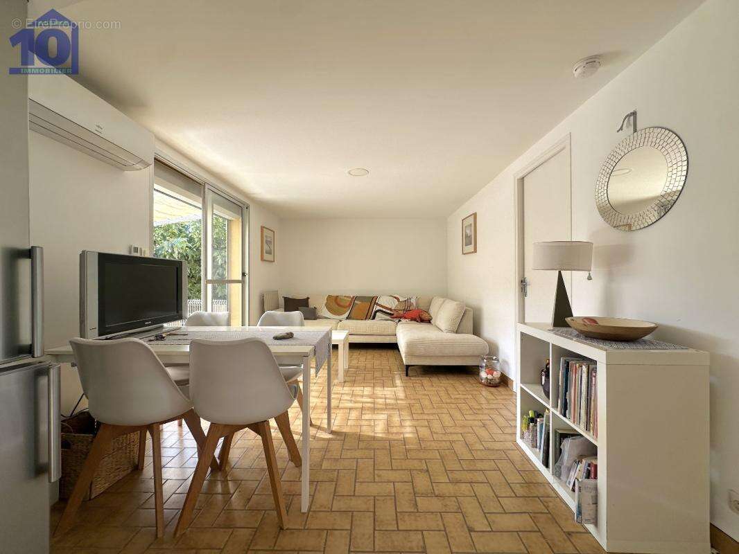 Appartement en rez-de-jardin - photo 2