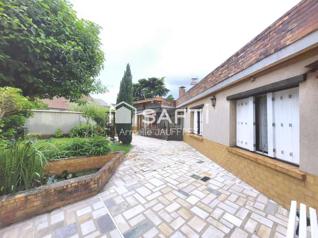 Photo 2 - Maison à ARNOUVILLE-LES-GONESSE