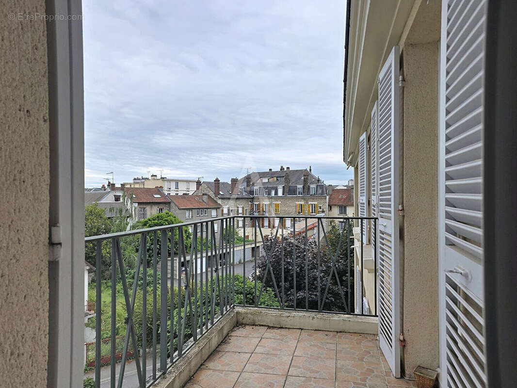 Mantes-la-Jolie Centre-ville Appartement 3 pièces de 67 m² avec balcon, ascenseur, box et cave ? Proche gare - photo 10