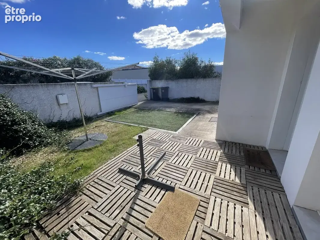 Maison de plain-pied avec extérieur ensoleillé, à proximité du centre-ville - photo 13