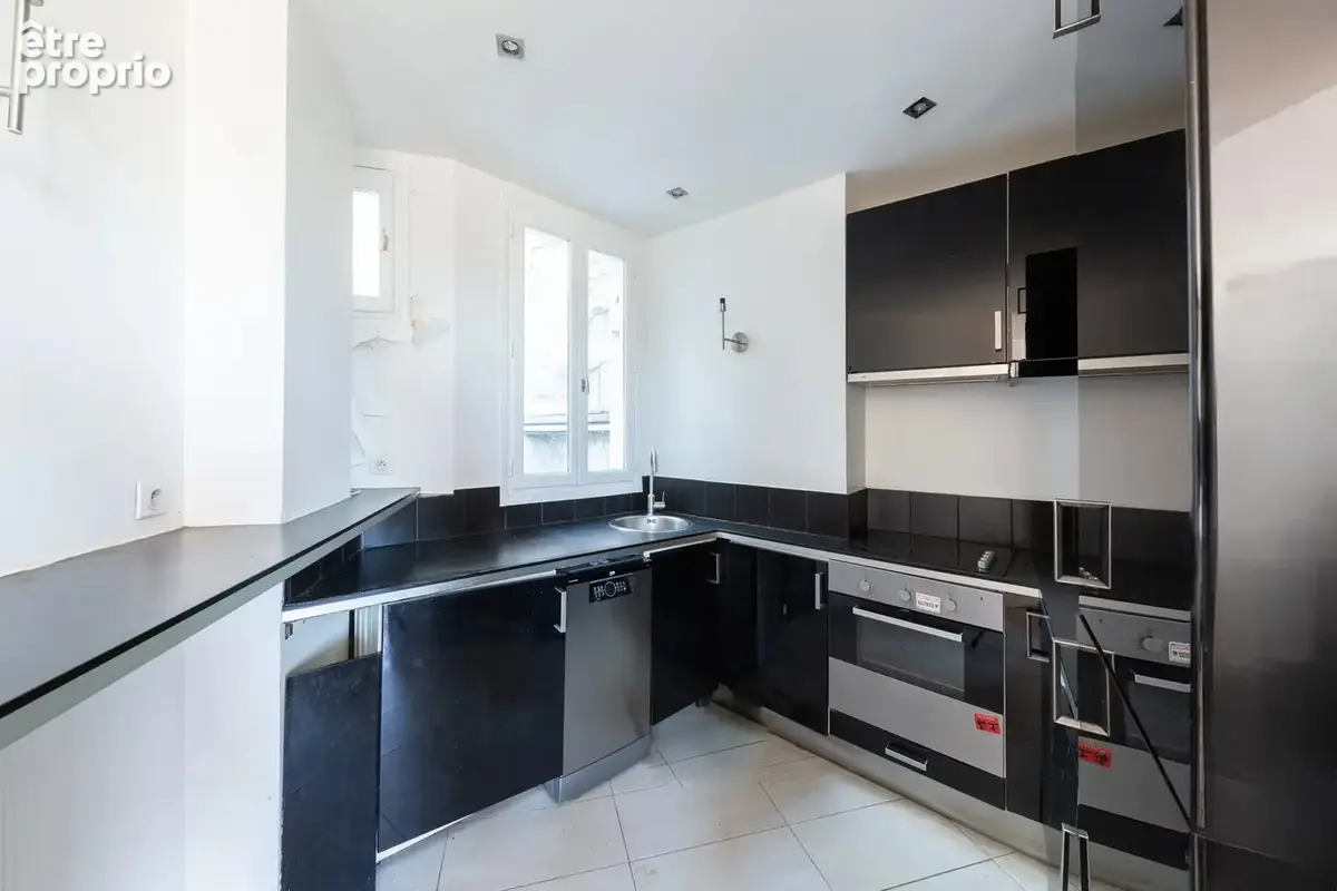 Île Saint Louis - Appartement de 77m² avec vue dégagée sur Seine - photo 10