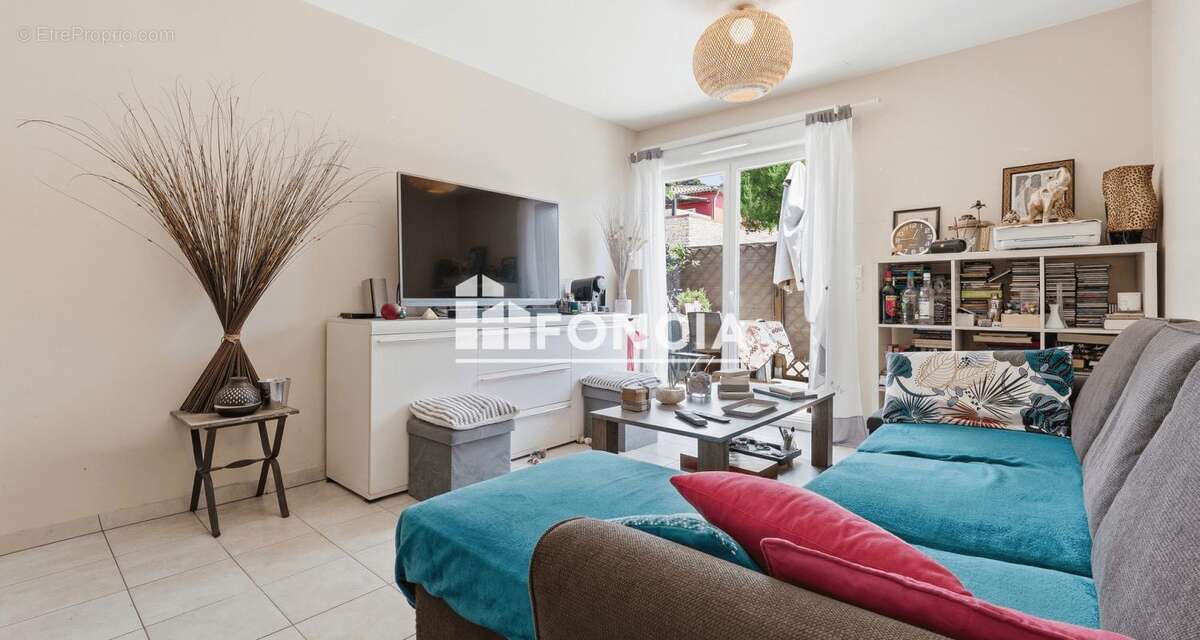 Appartement 2 pièces de 42m2 en rez-de-jardin avec terrasse et parking - loué - photo 5