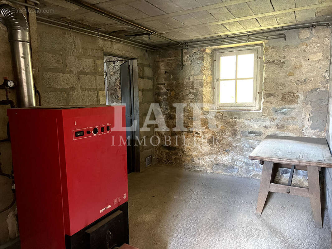 Maison de bourg en pierre, sur sous-sol  complet et jardin, Rânes. Réf : E15541 - photo 12