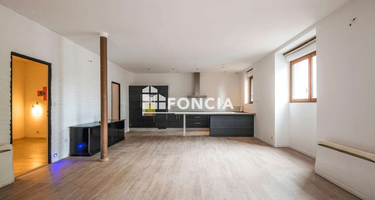 Esprit loft pour ce 3 pièces quartier Faubourg - photo 3