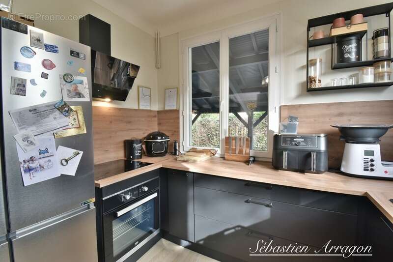 Maison plain-pied à vendre à Villeneuve-sur-Lot (47)– Maison rénovée avec jardin, proche commerces, idéale retraité ou couple - photo 3