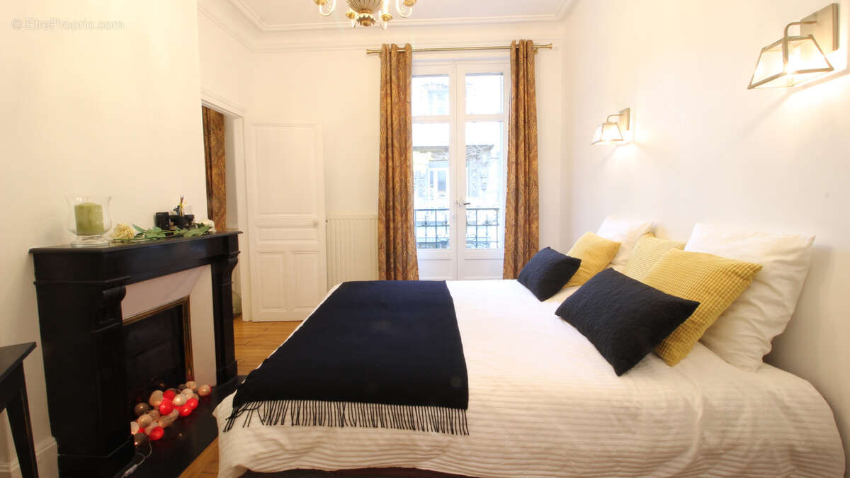 Bel appartement T2 avec ascenseur en centre-ville de Vichy avec cave et mansarde - photo 10