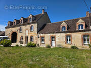 Maison à SUBLIGNY