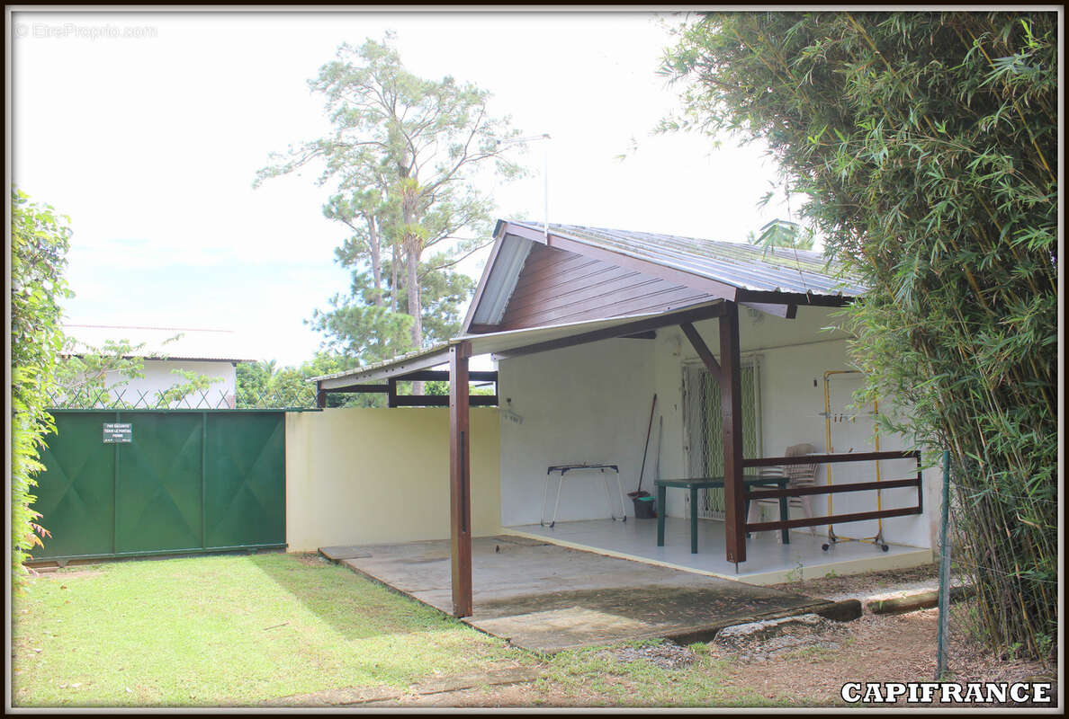 A vendre a kourou (97310) une magnifique maison en bois t5 de 106 m² avec 2 maisons t2 independantes - terrain de 775 m² - au pr - photo 18