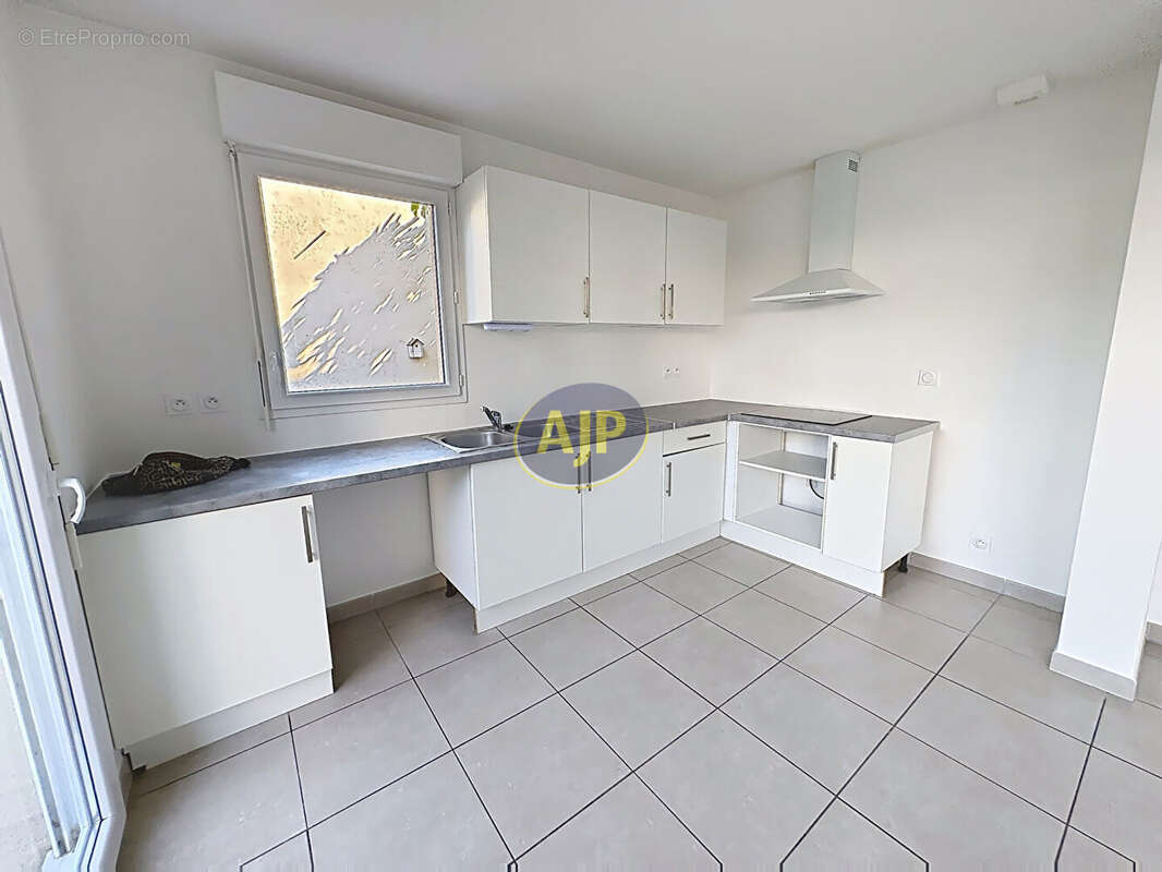 Appartement T4 avec terrasse et jardin - photo 3