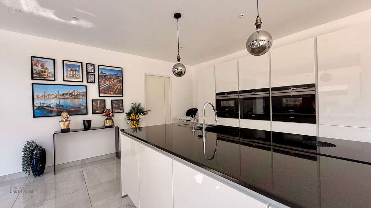 Maison contemporaine - 146,05 m2 - terrain 661 m2 - SAINT-RENAN - photo 3