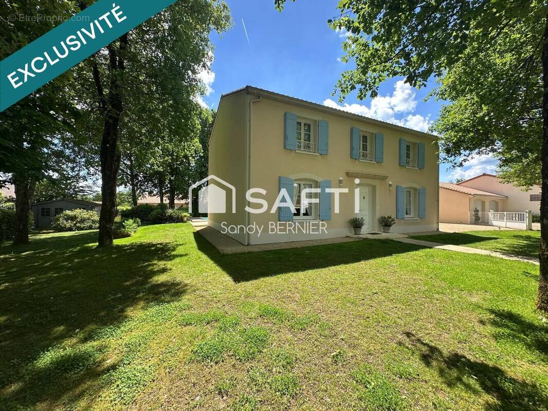 Photo 1 - Maison à FONTAINE-LE-COMTE
