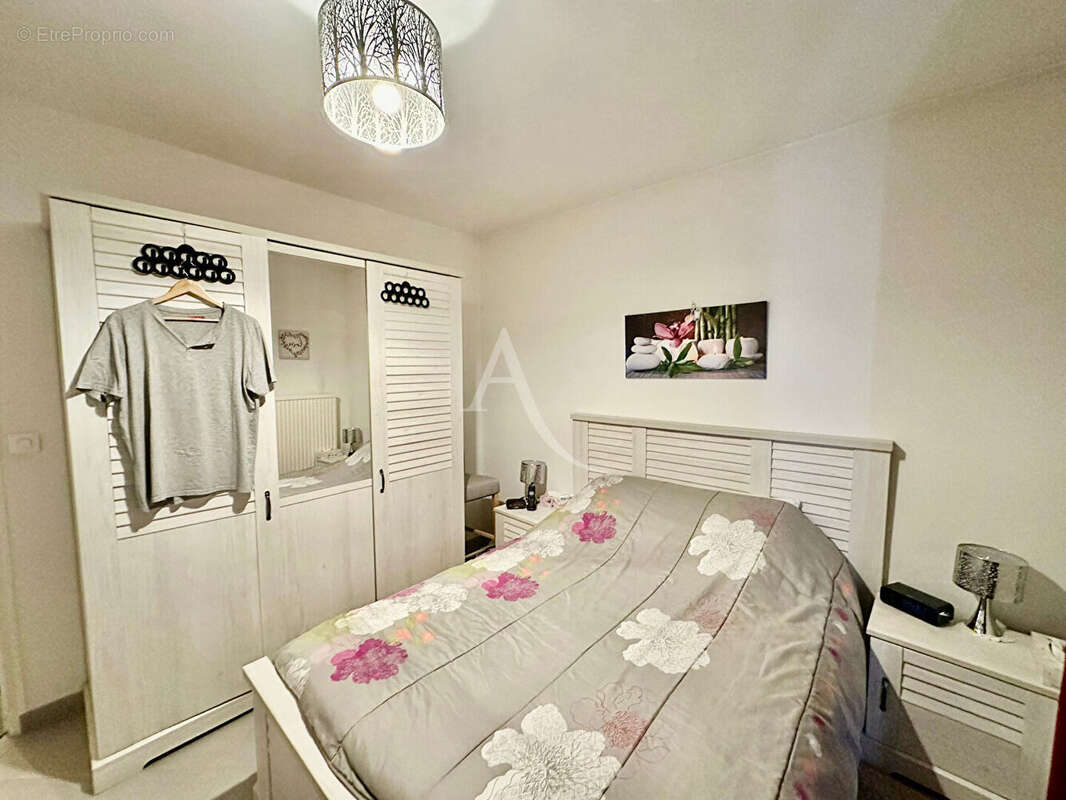 Appartement 3 pièces à vendre à Saint-Jean-de-Braye, 2 chambres, balcon, parking et cave - photo 5