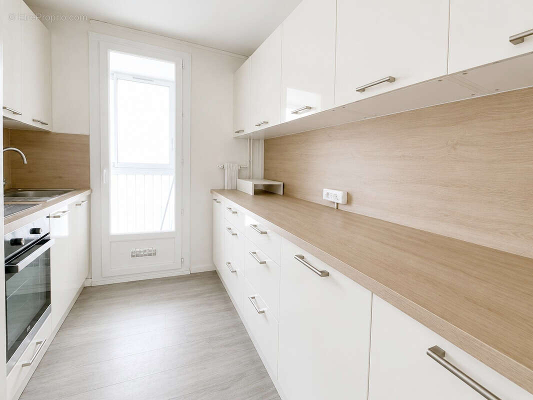 Appartement T4 traversant de 68m2 avec 3 chambres à proximité des commerces et écoles - photo 7