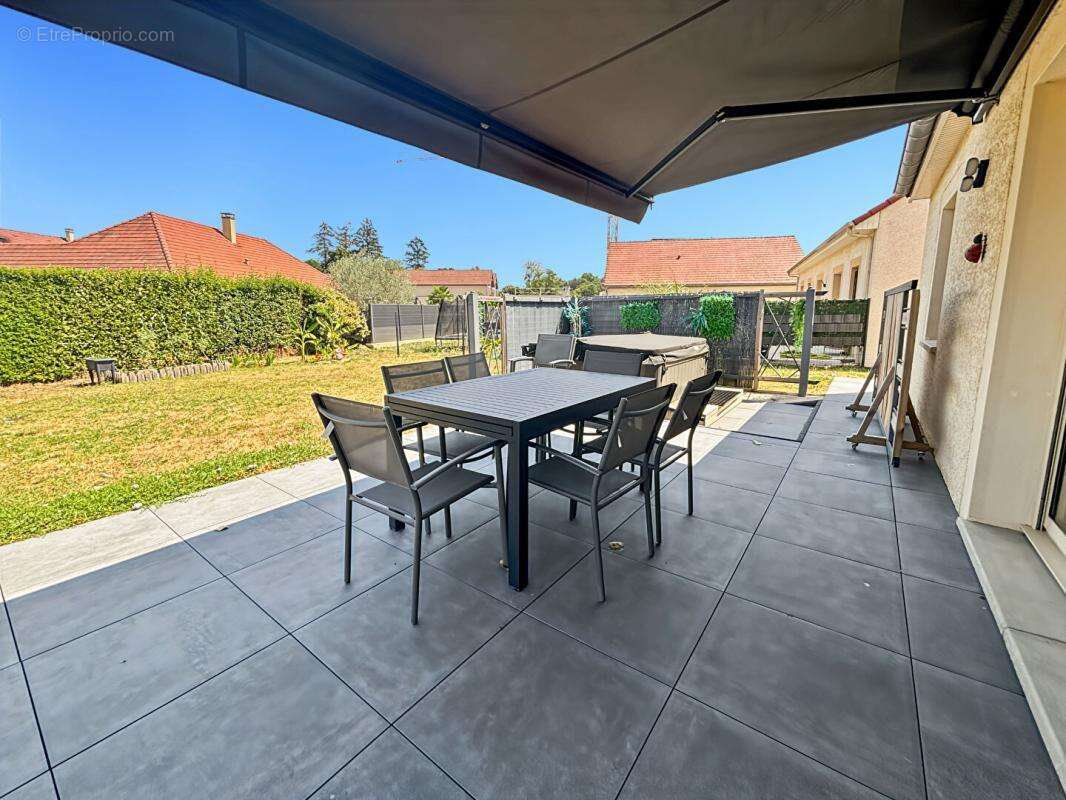 BRETENIERE - Maison plain pied 100 m2 - photo 11
