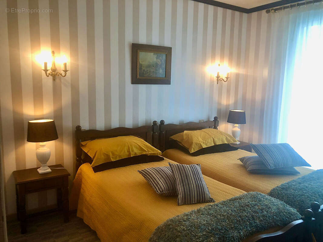 À l'abri des regards, maison chaleureuse où confort, intimité et douceur de vivre se rencontrent. - photo 8