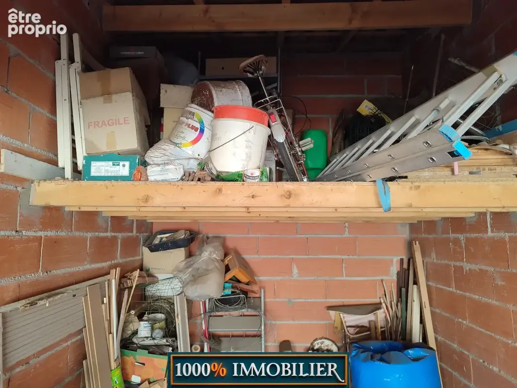 EXCLUSIVITÉ! Garage avec mezzanine eau et électricité.14 m2 - photo 2