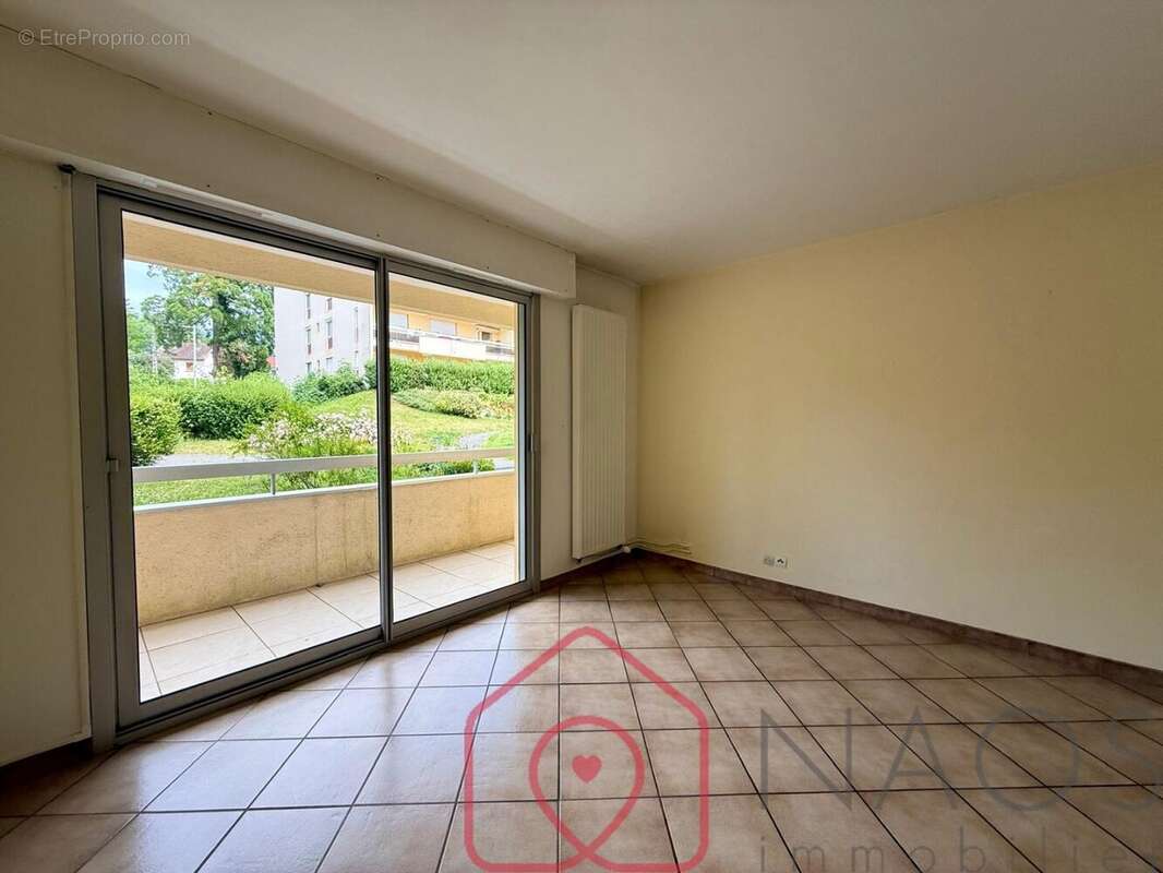 Appartement t2 en rez-de-chaussée avec balcon filant, cave et stationnements - photo 8