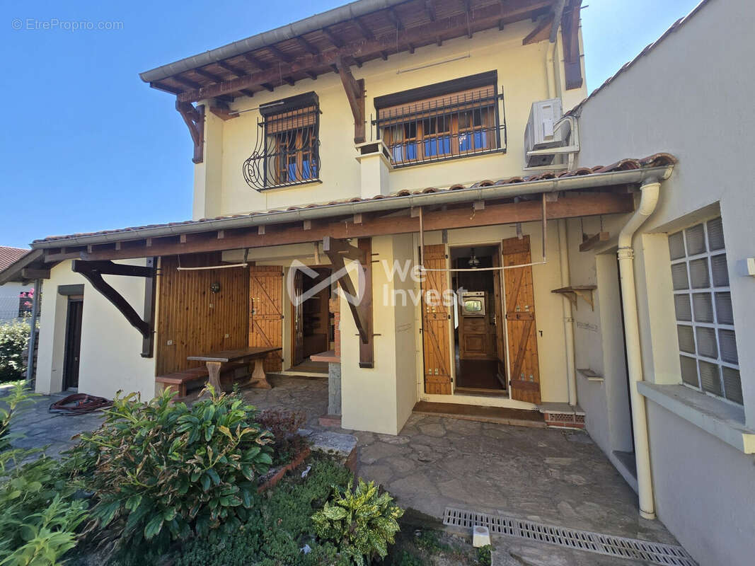 Façade  arrière maison coté jardin