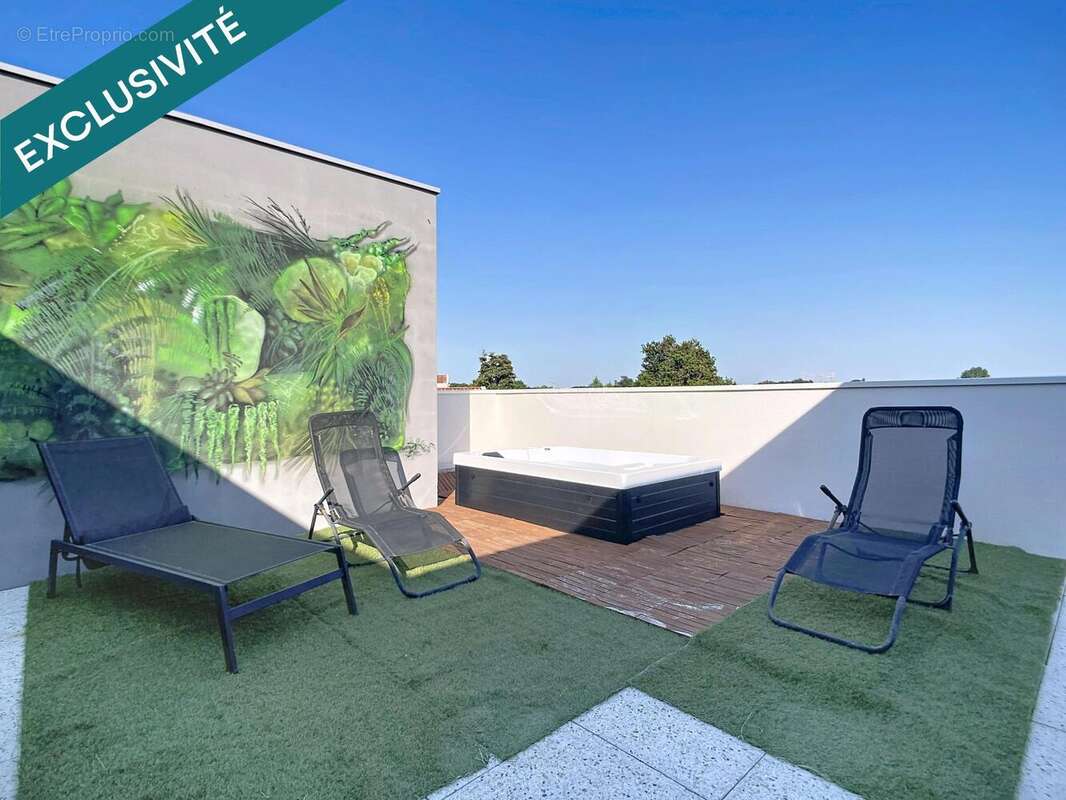 Photo 2 - Appartement à PAREMPUYRE