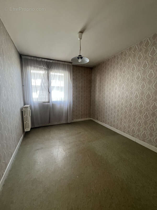 Appartement avec potentiel proche centre ville - photo 7