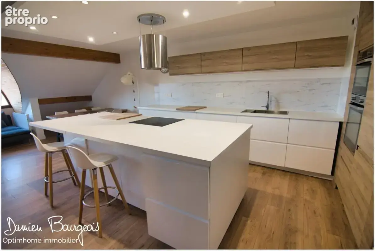 Duplex en dernier étage de 146 m² (208 m² au sol) avec double garage et cave - photo 2
