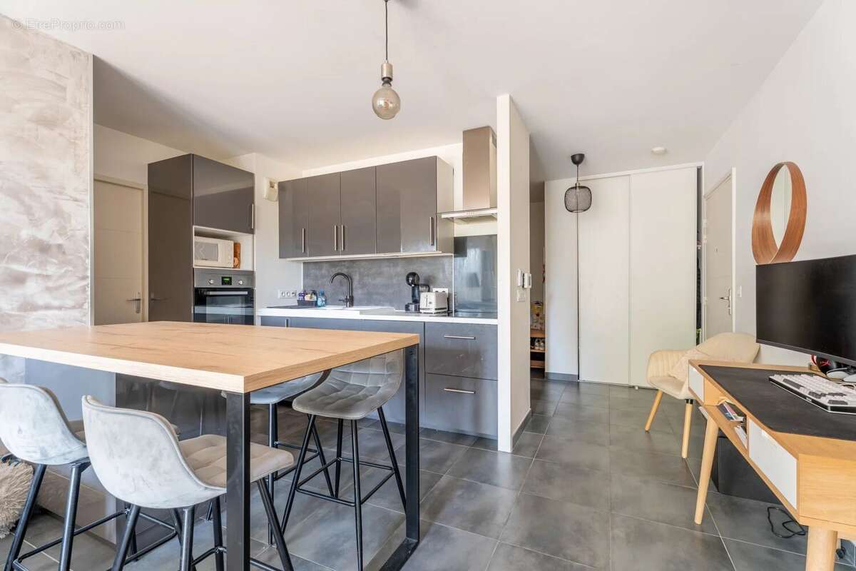 Appartement T4 avec terrasse et garage - photo 2