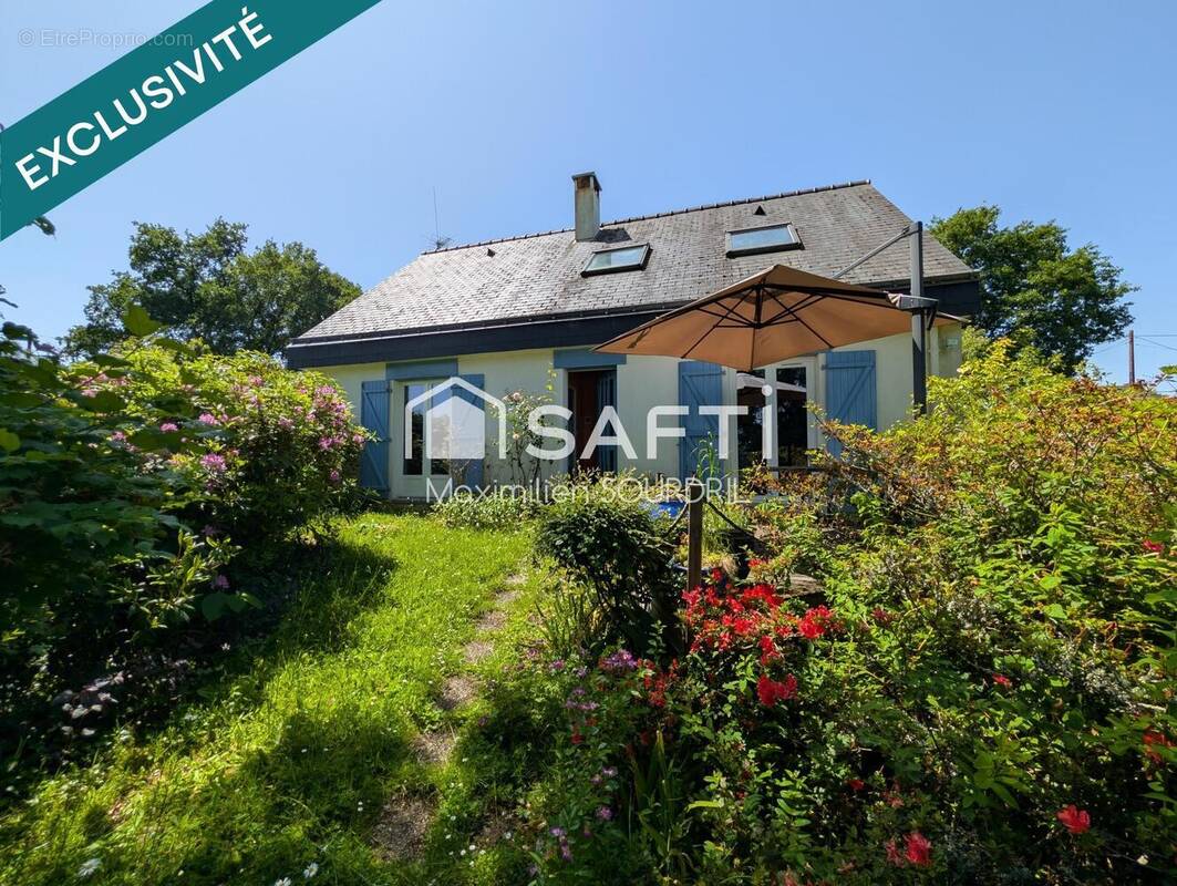 Photo 1 - Maison à SAINT-JEAN-LA-POTERIE