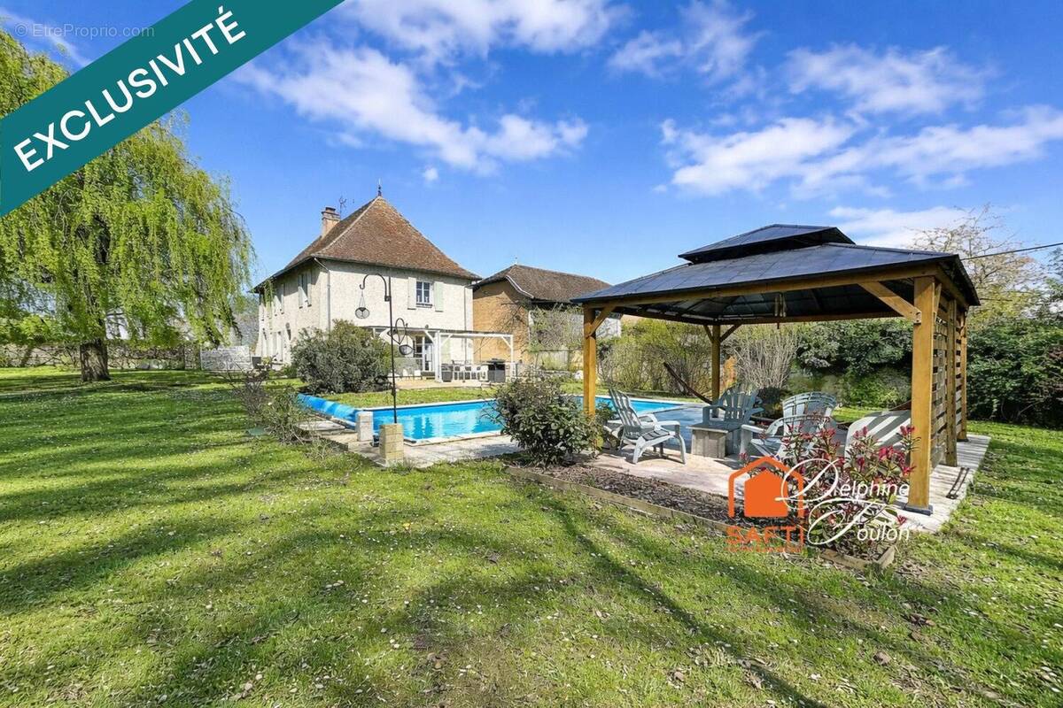 Photo 1 - Maison à VEYRINS-THUELLIN