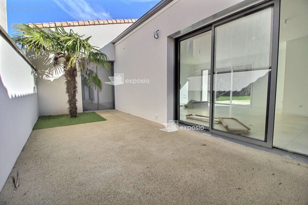 Maison neuve de plain-pied .117 m² .4 chambres . Garage . Terrain 816 m² - photo 2