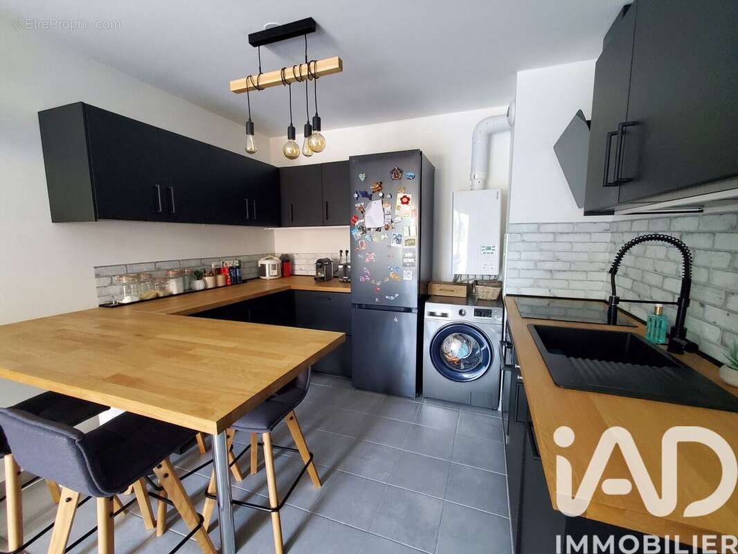 Photo 7 - Appartement à VOISINS-LE-BRETONNEUX