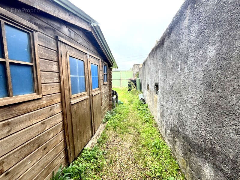 Immeuble 250m2 : un commerce + 2 appartements - photo 11