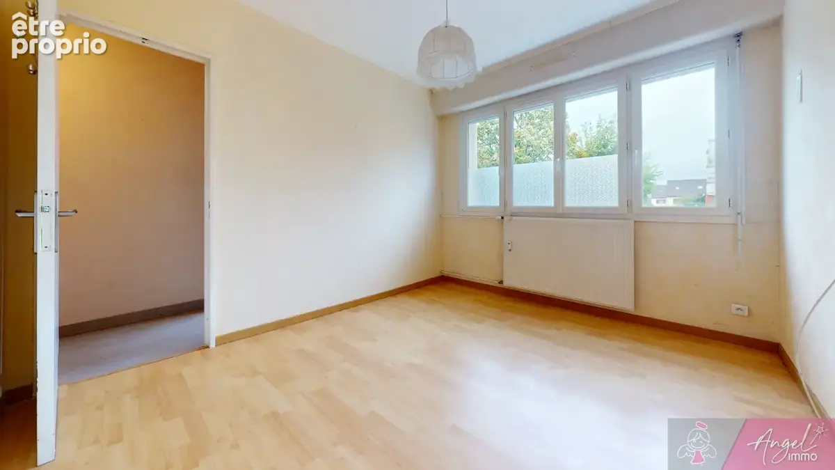 Appartement lumineux de 95 m2 avec 3 chambres, balcon et garage   Dole - photo 7