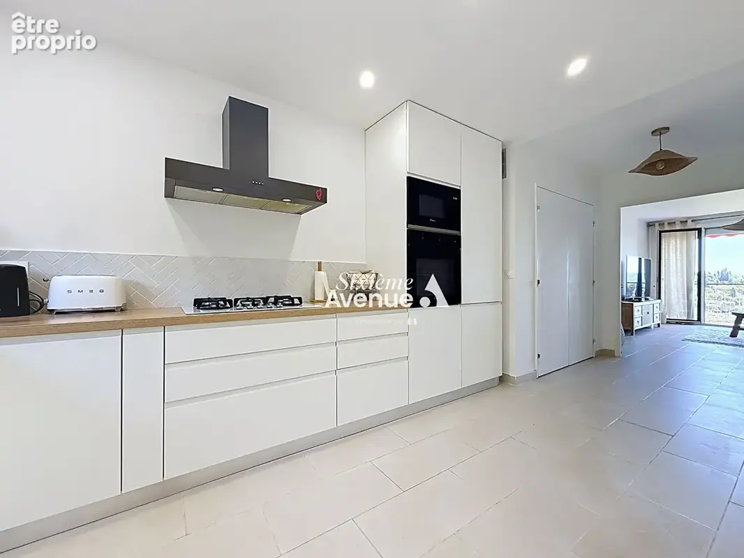 A vendre - Appartement rénové à Grasse 2 pièces de 51.25 m² avec parking couvert et grande cave - photo 4
