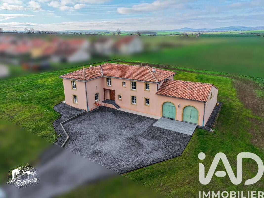 Photo 1 - Maison à LOUVIGNY