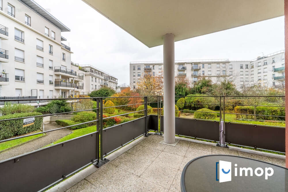T3 avec terrasse 16 m² et double parking sécurisé - photo 7