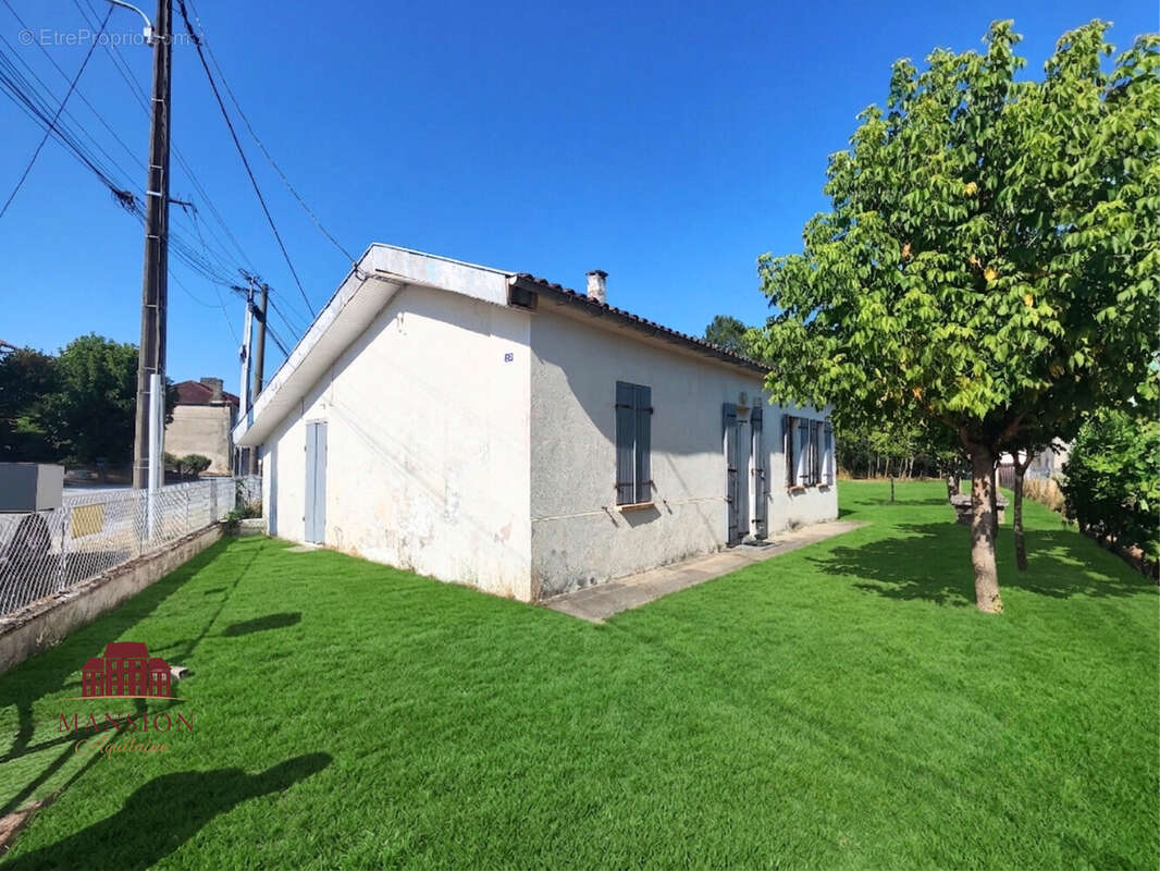 Maison avec garage - Jardin 412m2 - photo 2