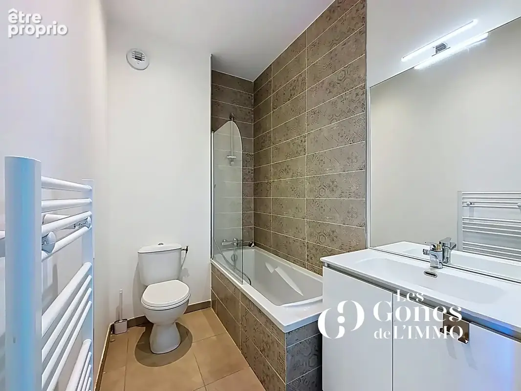 CRAPONNE   Un duplex familial de 102 m2 avec 3 chambres et deux terrasses - photo 14