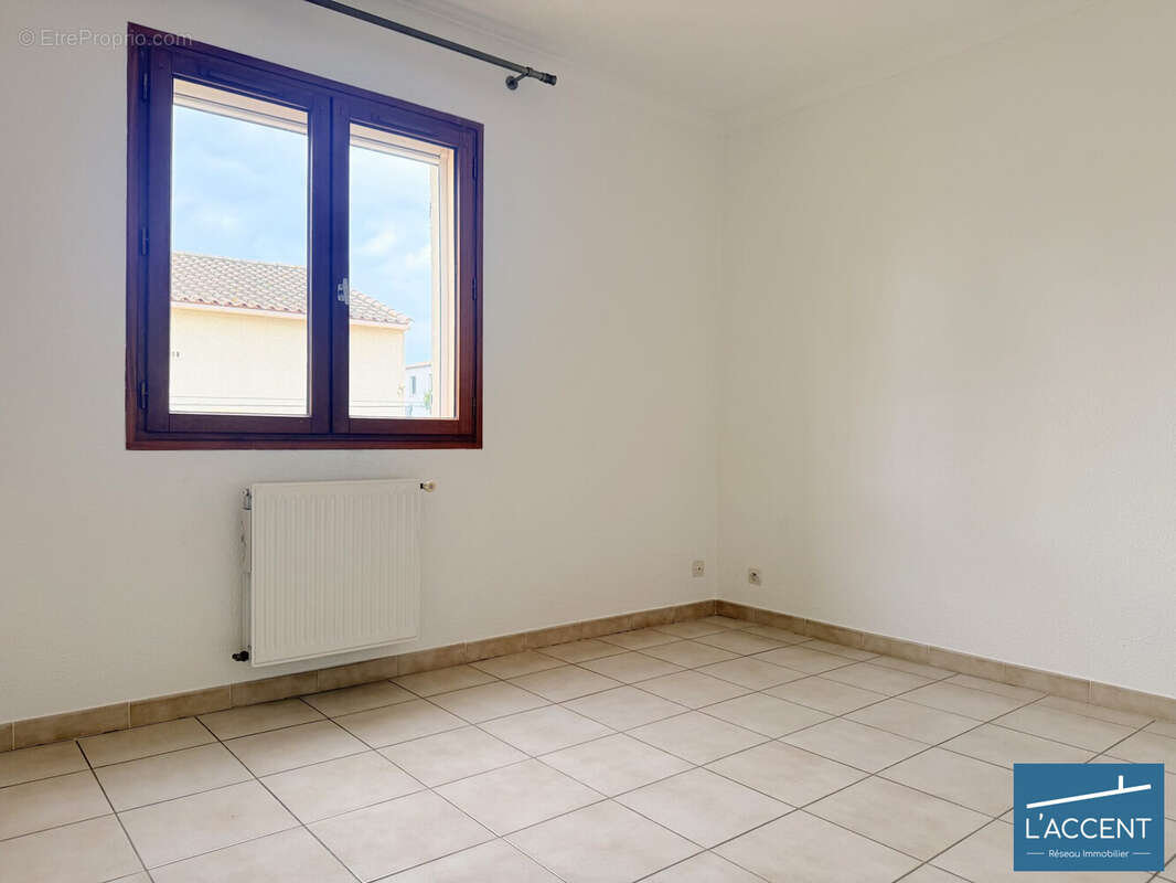 Chambre 1 - Maison à VERGEZE