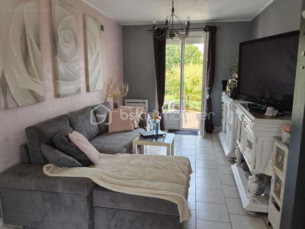 Pavillon individuel de 103m2 avec sous-sol complet sur un terrain clos et arboré de 1511m2 - photo 2