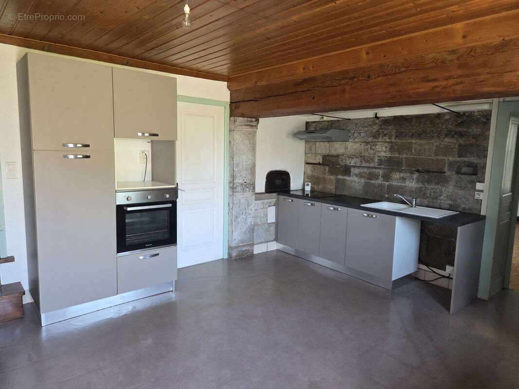 Un ensemble immobilier composé de deux appartements et une grange - photo 11