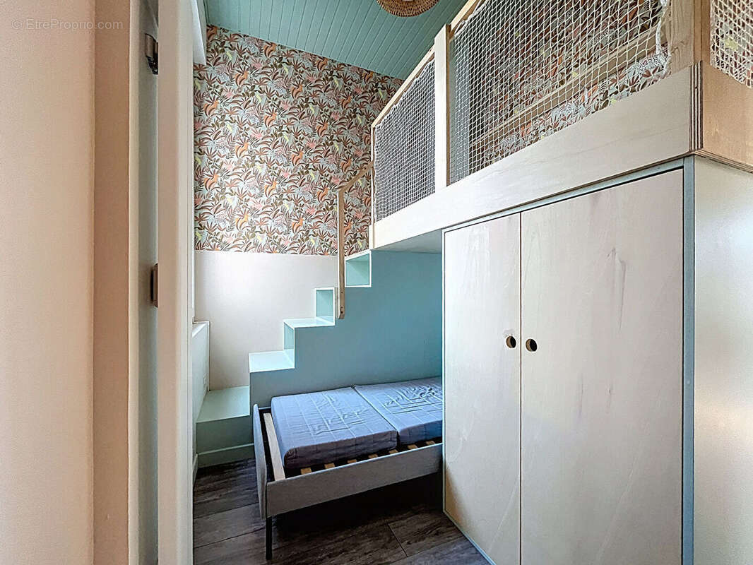 Un appartement de caractère baigné de lumière - pierres apparentes et parquet - photo 7
