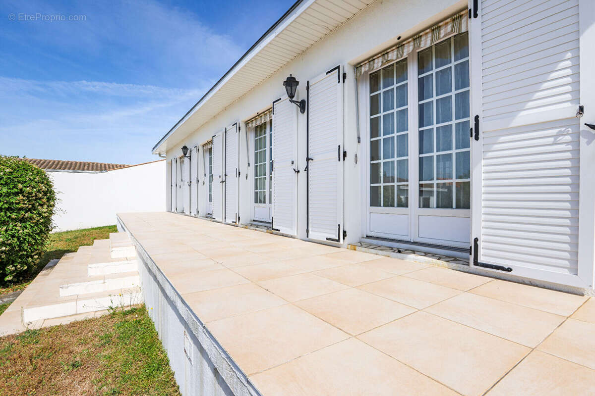 Maison 5 pièces 110m² avec grand garage et beau potentiel à Puilboreau - photo 6