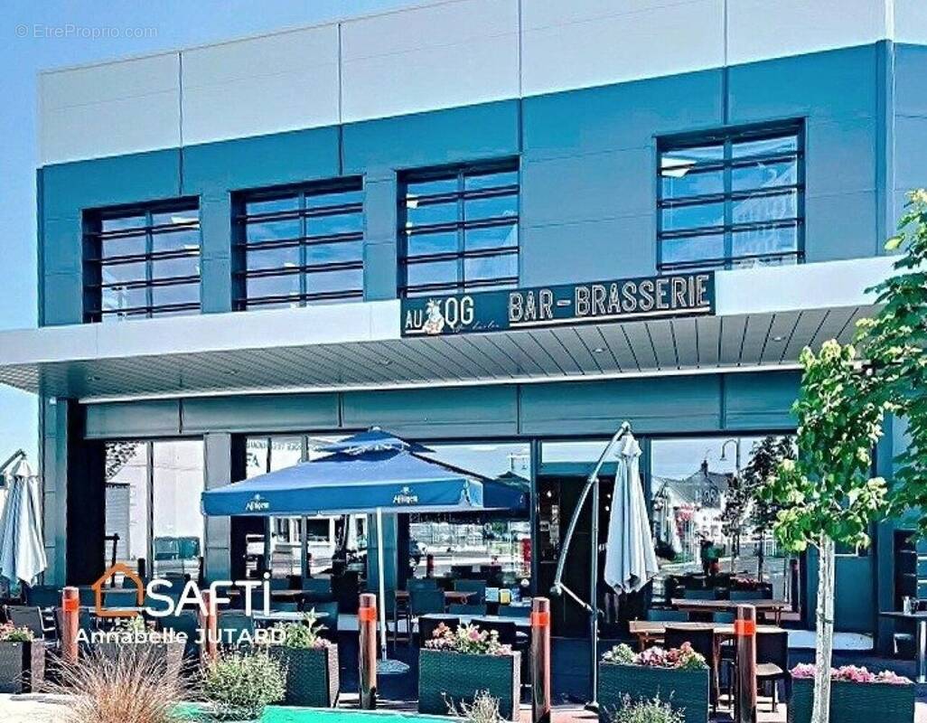 Photo 1 - Commerce à SORIGNY