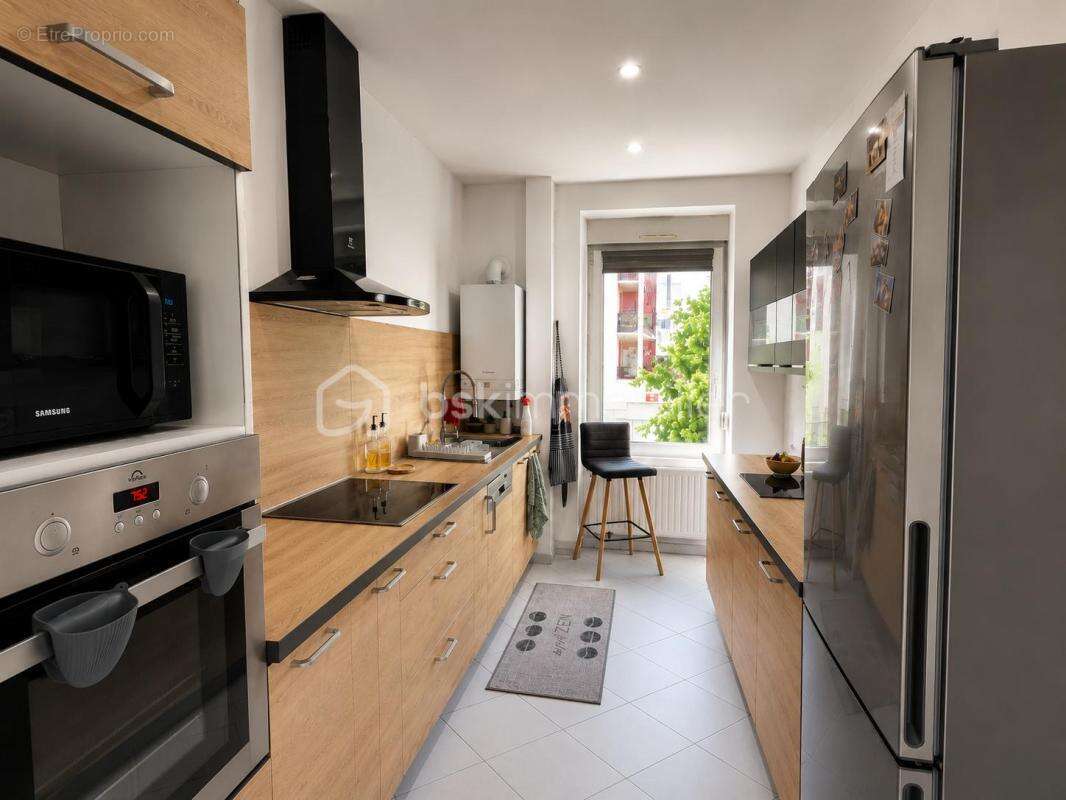 Investissement locatif – Appartement 3 pièces vendu loué – Rue d'Illzach à Mulhouse - photo 3