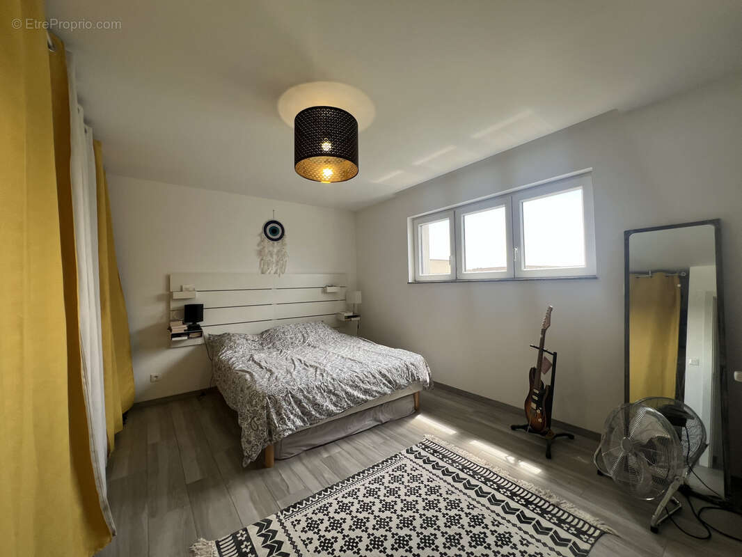 A Bischwihr, une superbe maison individuelle à toit plat 5 pièces de 125 m2 de 2020 de surface habitable sur u - photo 9