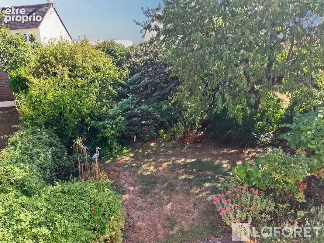 Charmante maison de 110m2 avec jardin, sous-sol et garage - photo 11