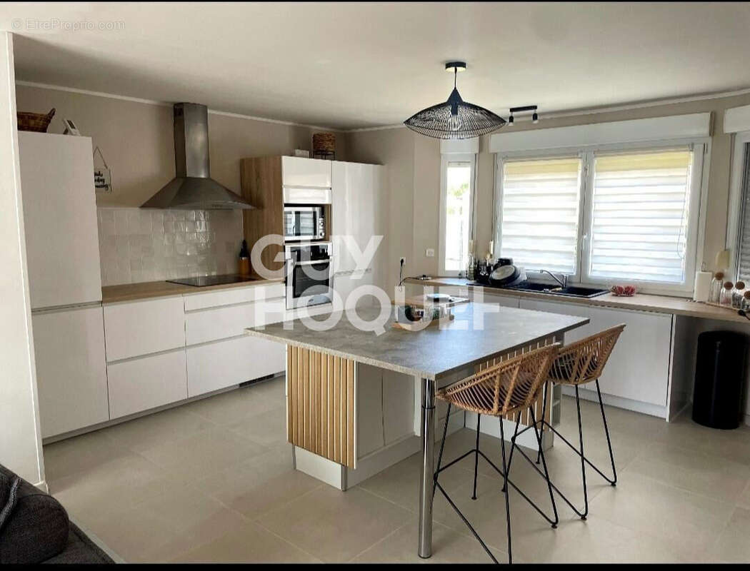 Maison à DOUCHY-LES-MINES